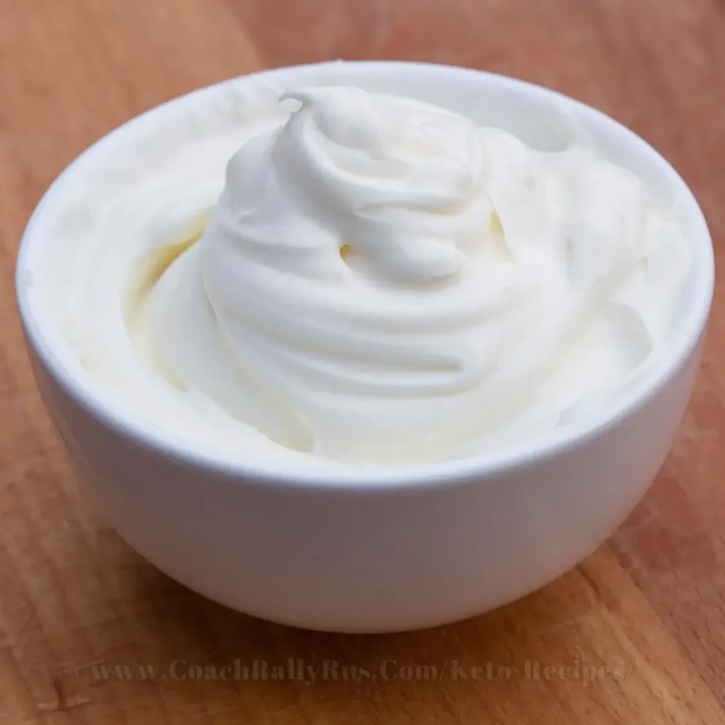 A visual comparison of cottage cheese and cream cheese, showcasing the distinct textures of each, with the creamy and smooth cream cheese on one side and the lumpy, curd-like cottage cheese on the other, both ready to be used in various recipes.