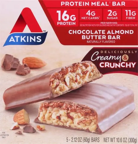 An Atkins Chocolate Almond Butter Bar is featured in a promotional image, highlighting its nutritional benefits of 16g of protein, 4g net carbs, 2g sugar, and 11g fiber per serving. The bar is presented as both creamy and crunchy to appeal to health-conscious snackers.
