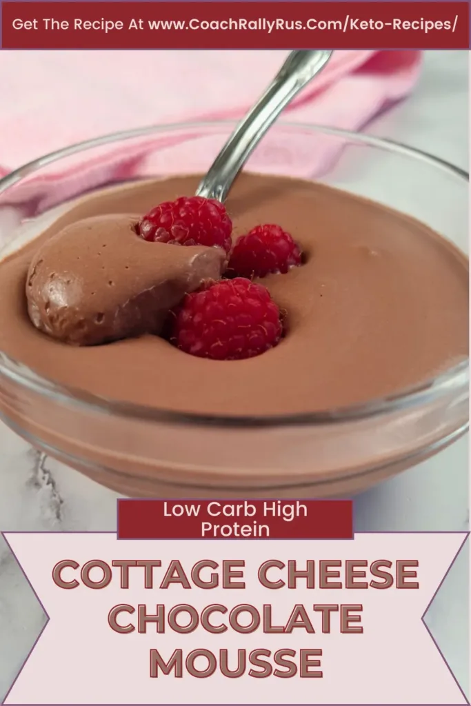 Decadent Whipped Cottage Cheese Chocolate Mousse topped with a vibrant raspberry, perfect for a keto diet. Visit our site for the full recipe!