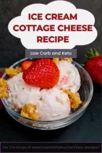 A Pinterest pin featuring a luscious scoop of Keto Strawberry Cottage Cheese Ice Cream, topped with a ripe strawberry and a sprinkle of crumble, showcasing a delicious low-carb, high-protein dessert option for those on a ketogenic diet.