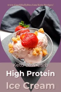 A Pinterest pin featuring a serving of Keto Strawberry Cottage Cheese Ice Cream, beautifully garnished with a fresh strawberry and crumbly topping, highlighting a delicious and nutritious low-carb, high-protein dessert option.