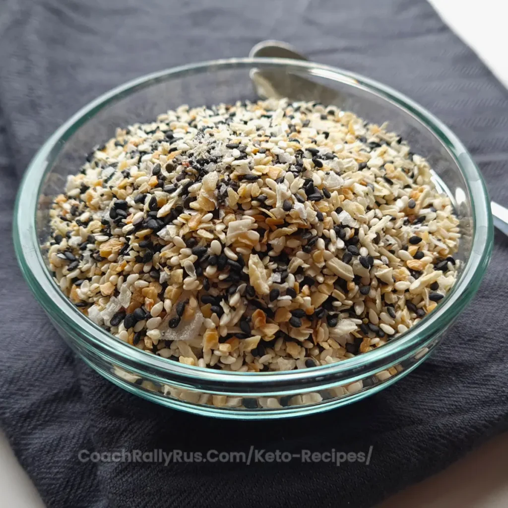 A close-up view of Everything Bagel Seasoning in a glass bowl.