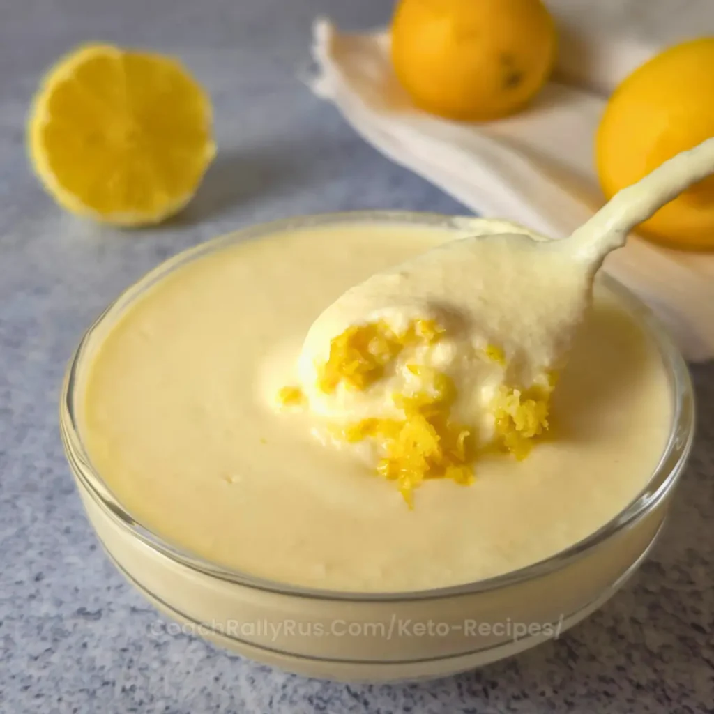 creamy cottage cheese lemon curd in bowl with lemon and spoon