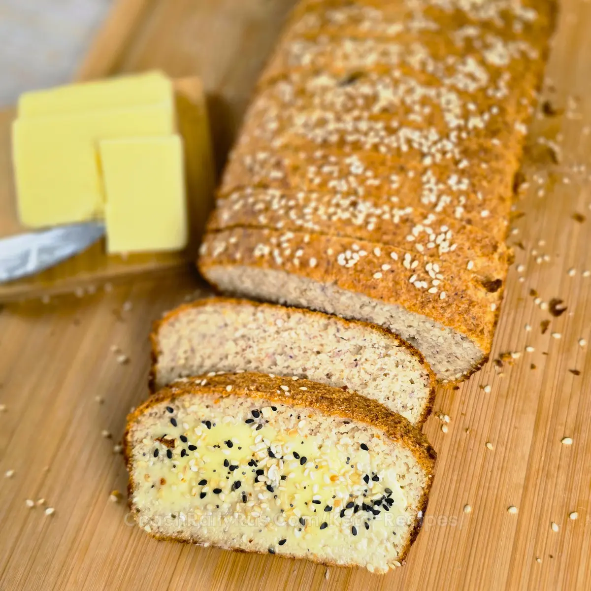 sliced eggless high protein keto bread with melted butter and everything bagel seasoning
