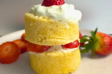 sugar free strawberry shortcake mug cake with whipped topping