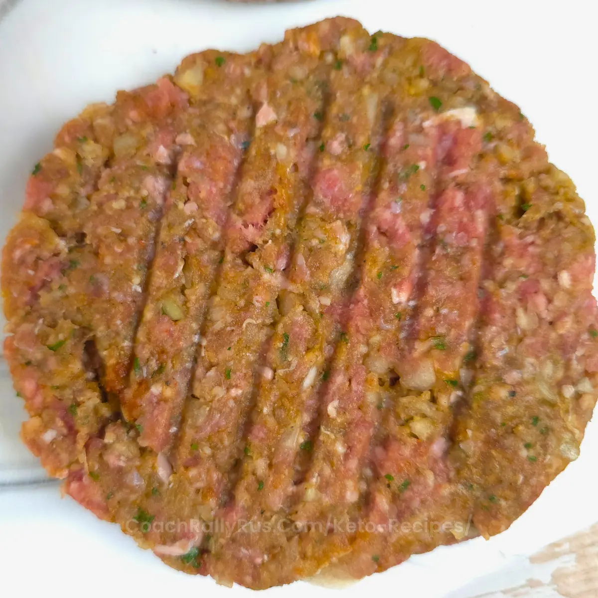 Close-up of uncooked keto Mediterranean burger patty