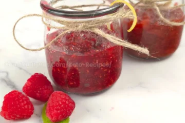 Jars of raspberry chia jam decorated with twine