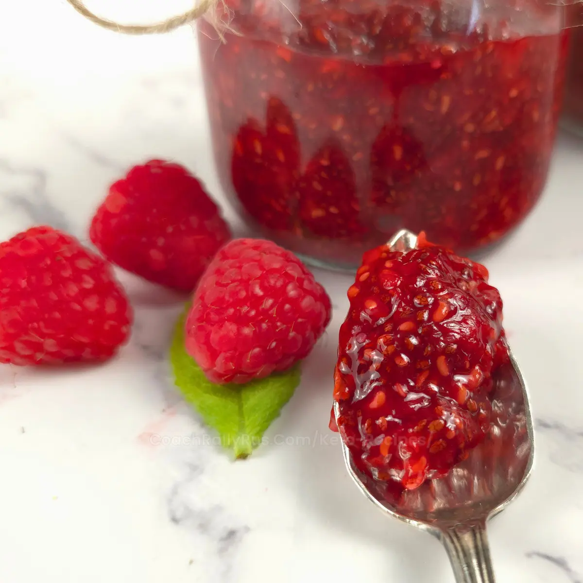 Keto chia jam with raspberries and mint leaf