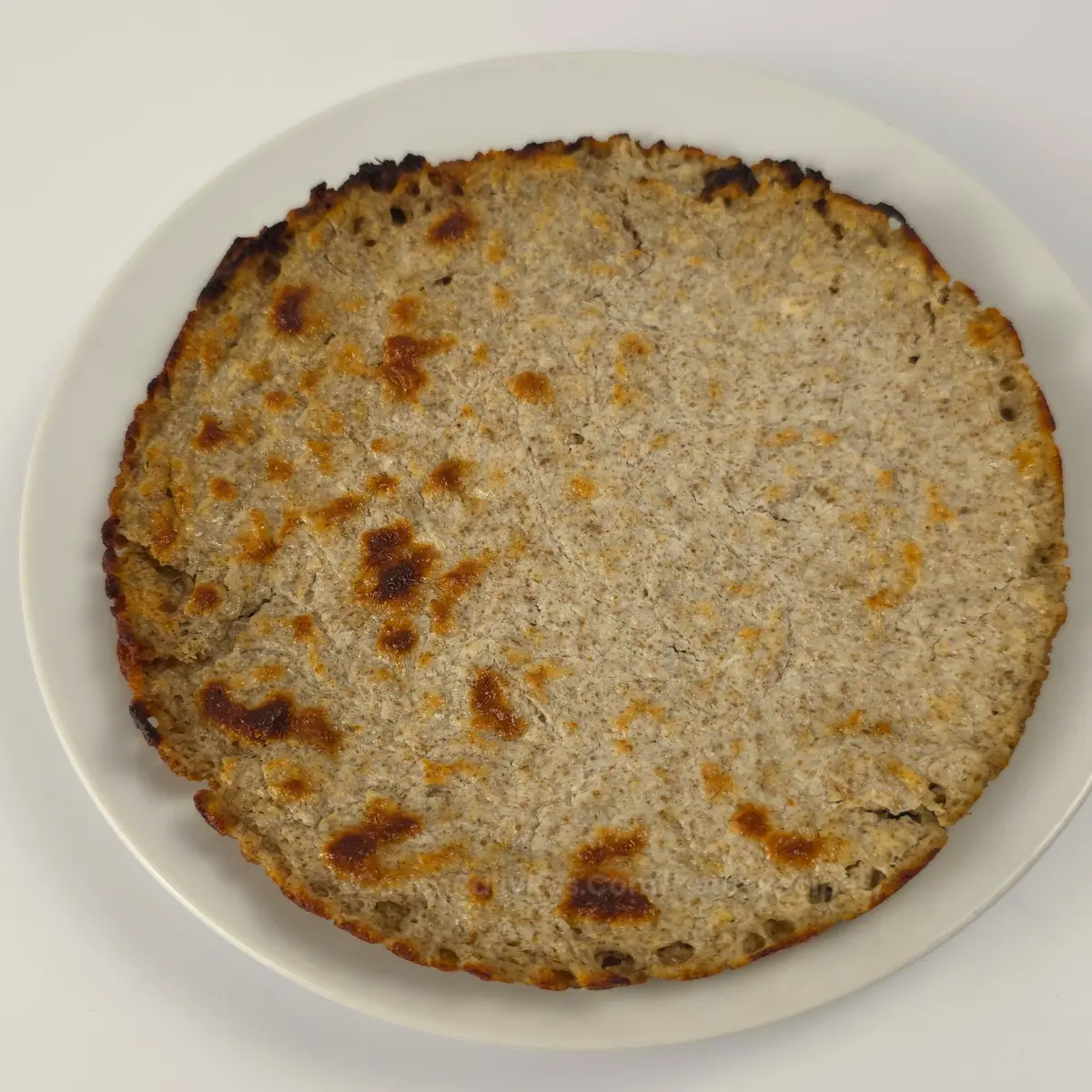 whole baked cottage cheese chia wrap on plate