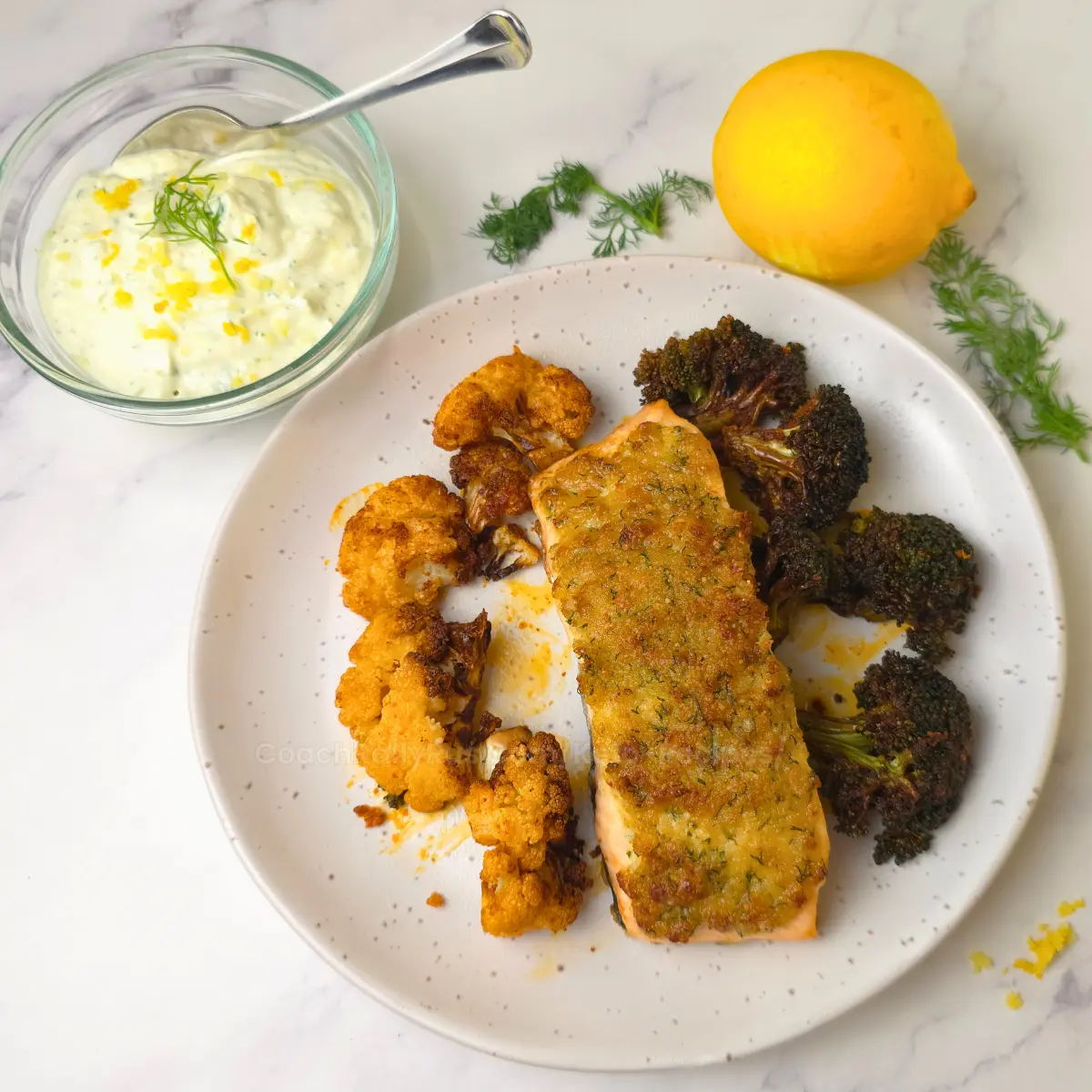 Almond parmesan crusted salmon with broccoli and cauliflower
