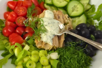 Keto mackerel salad with creamy ranch spooned on top