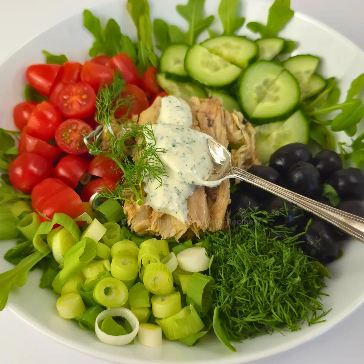 Keto mackerel salad with creamy ranch spooned on top