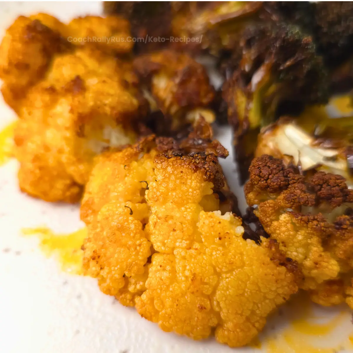 Roasted cauliflower floret with golden edges on a plate