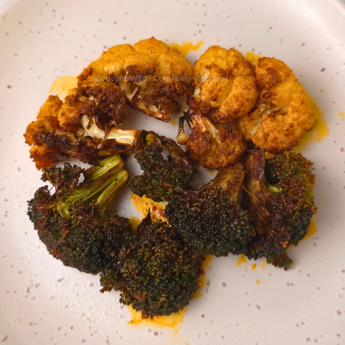 Roasted cauliflower and broccoli keto side arranged in circle