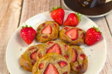 Overhead view of strawberry chia cookies with coffee and berries